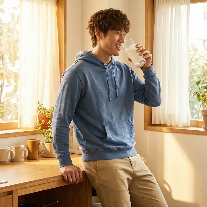 Lee Juyeon Drinking Milk in Tranquil Kitchen Scene