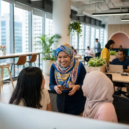 Cheerful Malay Woman in Professional Office Setting