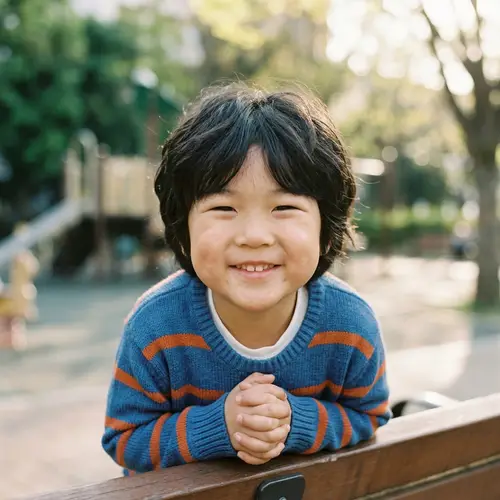 Adorable Asian Boy with Round Face and Chubby Cheeks