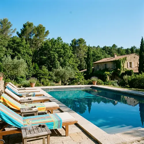 Tranquil Outdoor Swimming Pool Surrounded by Lush Greenery