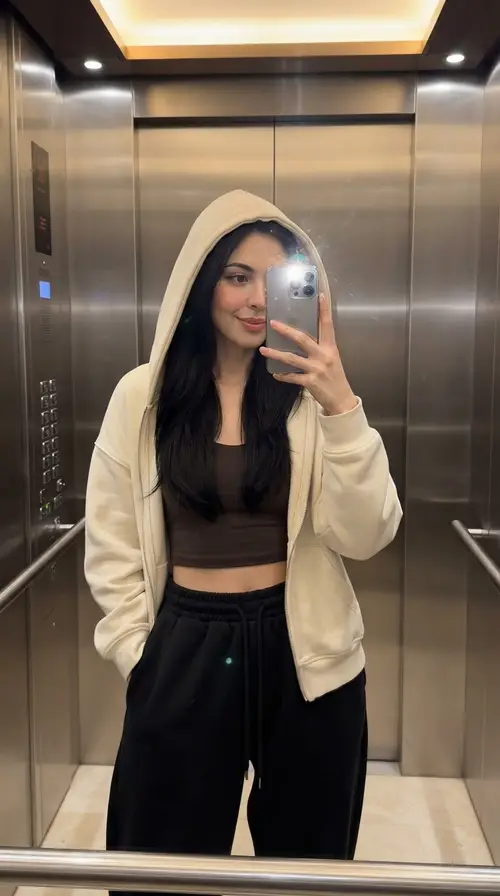 Realistic Mirror Selfie of Asian Woman in Elevator