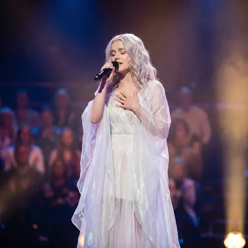 Passionate Singer in Ethereal Dress on Stage | Music Performance