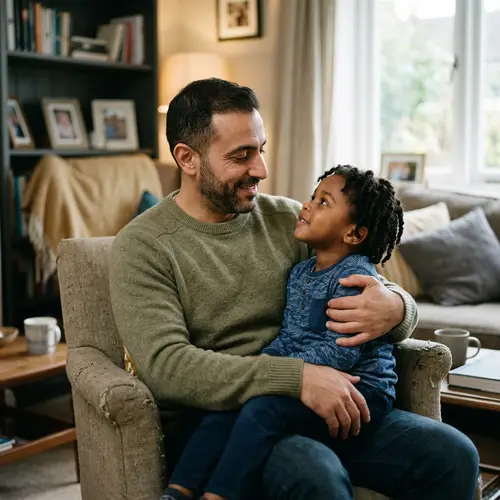 Tender Middle-Eastern Man with Admiring Black Boy