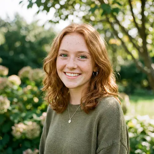 Pretty 16-Year-Old Girl with Ginger Hair and Freckles