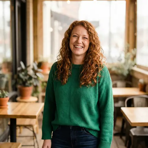 Captivating Red-Haired Woman with Warm Smile