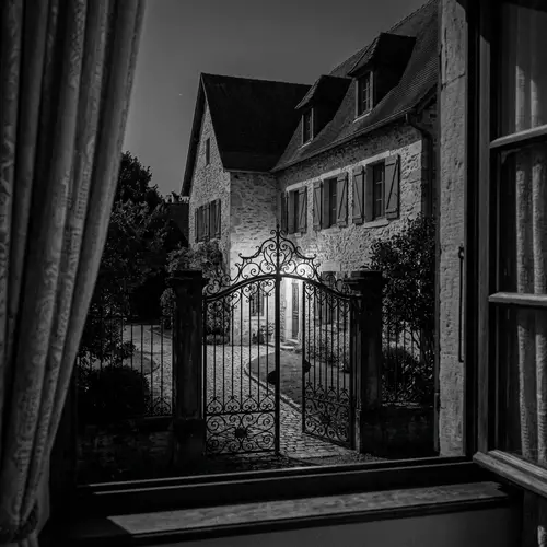 Monochrome Three-Story House at Night | Intricate Gate View