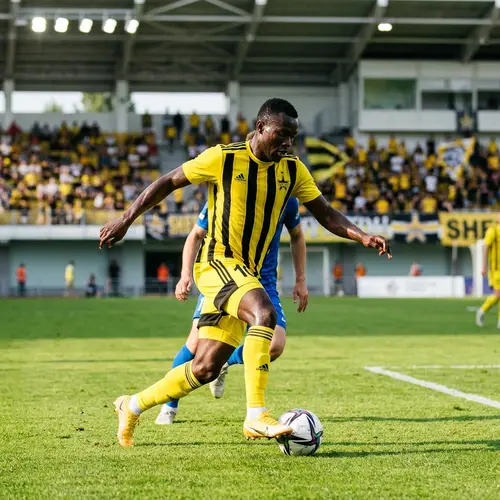 Black Male Football Player in Yellow and Black Colors | Sheriff FC