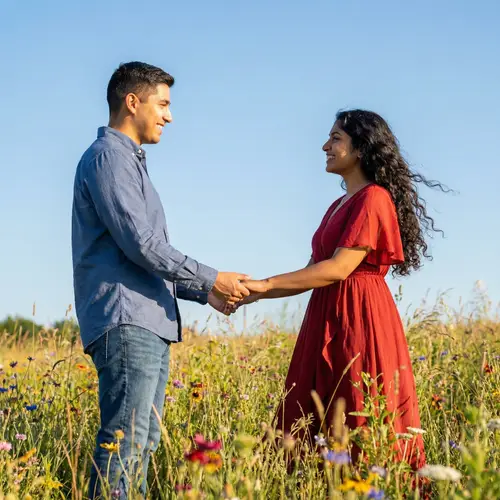 Cute Couple in a Sunny Meadow
