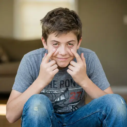 Stylish Caucasian Teenage Boy with Playful Mood