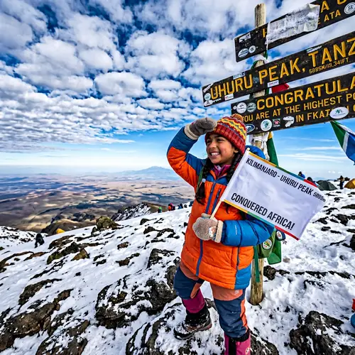 Adventurous South Asian Female Child Conquers Mount Kilimanjaro