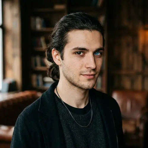 Mysterious Young Man with Dark Hair and Heterochromia