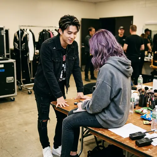 Young Male Asian Pop Star and Girl with Purple Hair at Table