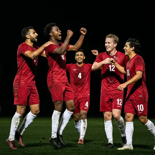 Energetic Red-Jersey Football Players Celebrating Goal