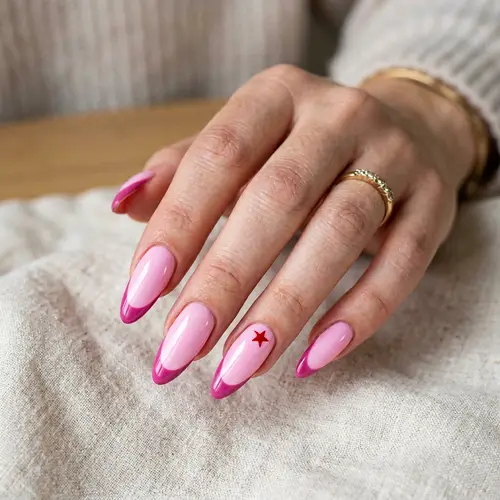 Stylish Pink Almond Shaped Nails with Red Star Design