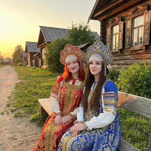 Traditional Russian Folk Attire and Village Scene