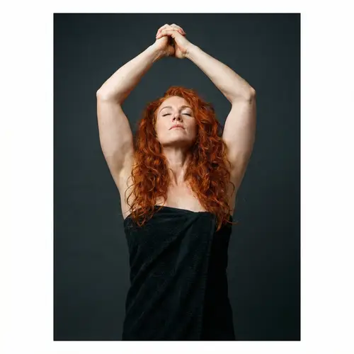 Striking Redheaded Woman Portrait with Empowered Posture