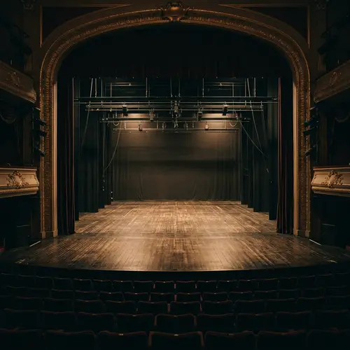 Empty Proscenium Stage with Soft Lighting