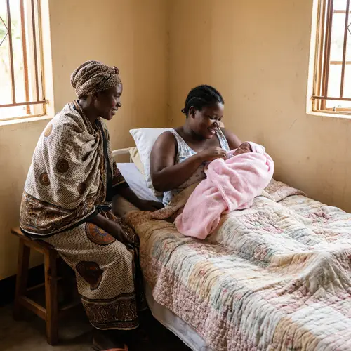 Loving Moments: African American Woman with Newborn