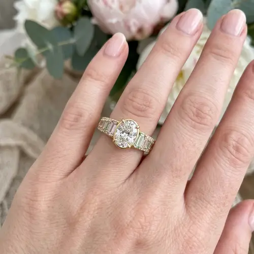 Stunning Oval Diamond Engagement Ring with Baguette Stones