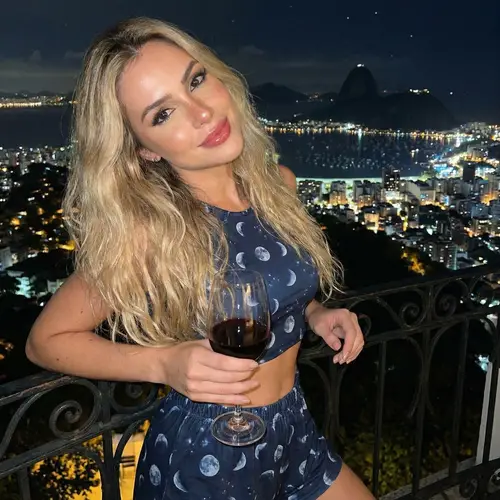 Chic Valentine's Day Pyjamas | European Woman on Balcony in Rio with Wine