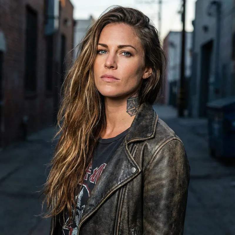 Stunning Badass Woman with Blue Eyes and Neck Tattoo