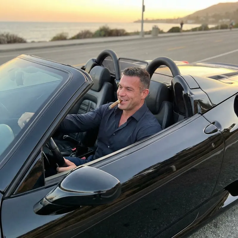 Andrew Tate Smoking Cigar in Sports Car