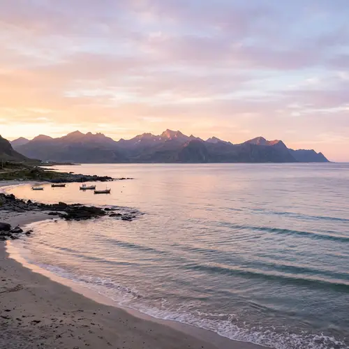 Serene Seascape with Mountains at Dawn