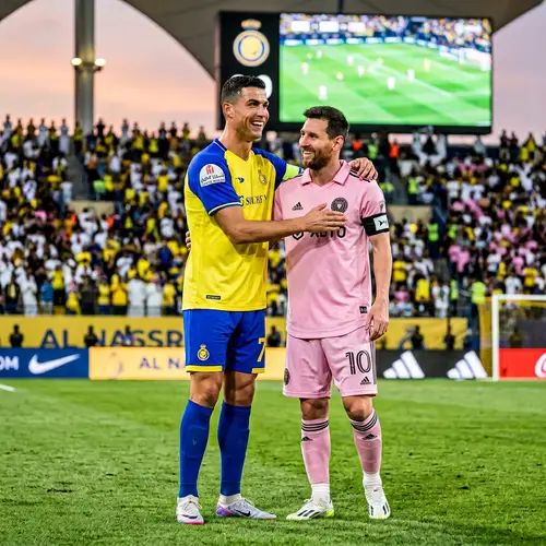 Ronaldo and Messi: A Smiling Duo in Jerseys