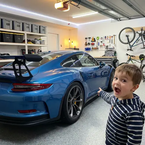 Luxurious Sports Car Parks in Well-Organized Garage