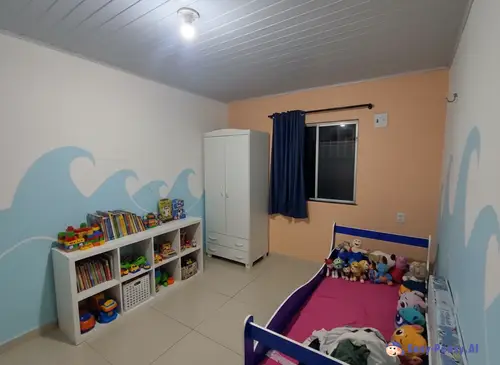 Children's Bedroom with White Wardrobe & Blue Bed