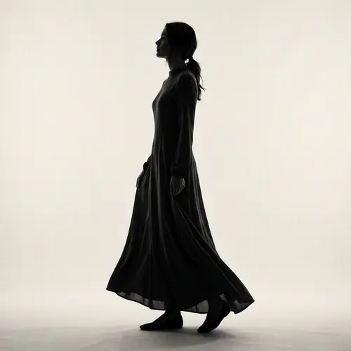 Elegant Silhouette of Fully Clothed Female Figure