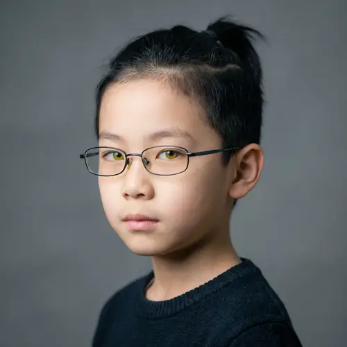 Stylish Boy with Glasses and Yellow Eyes