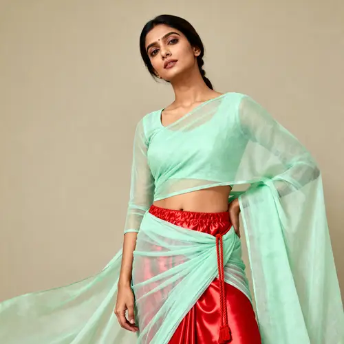 Elegant Indian Woman in Sheer Pastel Green Saree
