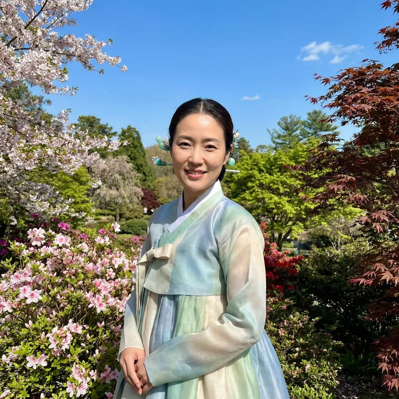 Beautiful East Asian Woman in Traditional Attire - Tranquil Garden Setting