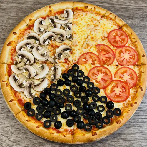 Delicious Four-Quarter Pizza with Varied Toppings