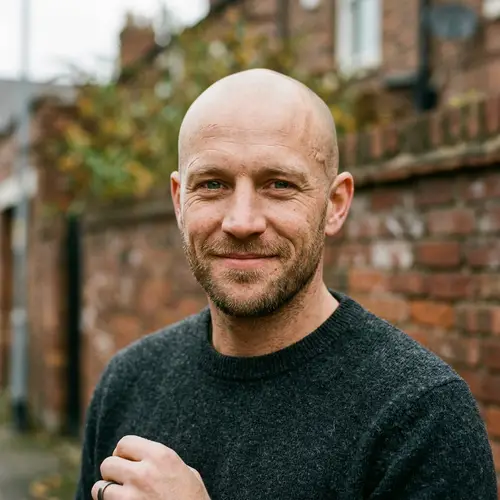 Portrait of a 33-Year-Old Man: Bald and Scarred