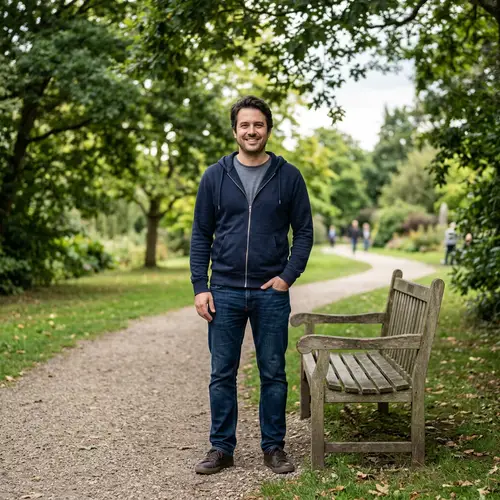 Relaxed Man in Casual Attire - Peaceful Park Setting