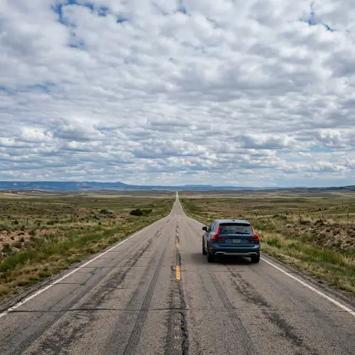Solitary Car Journeying on Endless Road