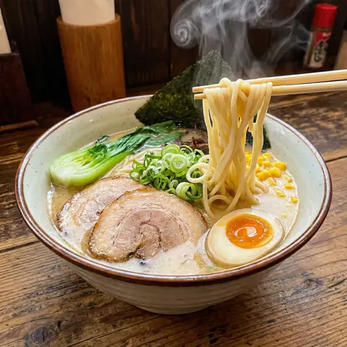 Delicious Ramen Bowl with Tender Meat and Fresh Vegetables