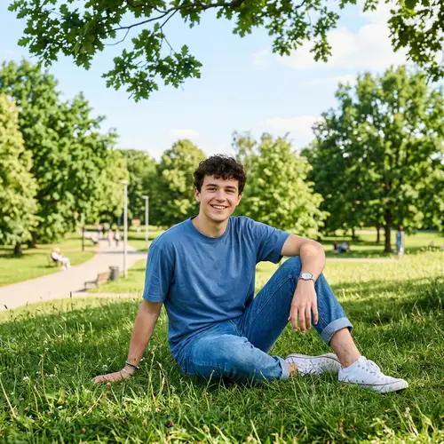 Casual Park Vibes: Young Man on Grass