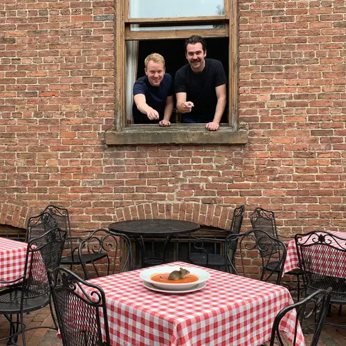 Funny Scene with Two Guys at a Restaurant Window