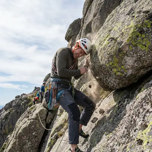 Mountain Climbing Accident: Person Hits Head on Boulder