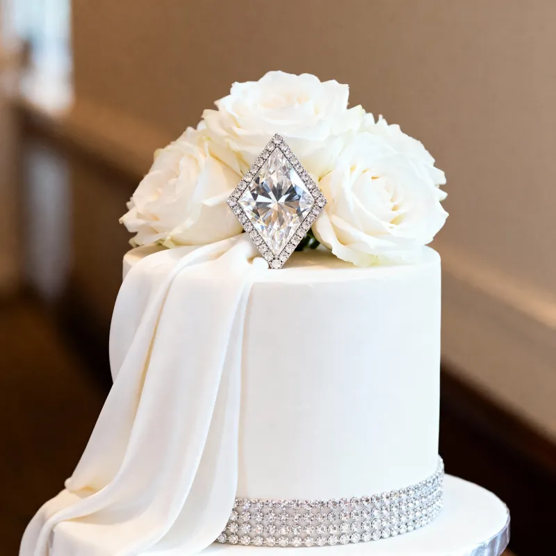 Elegant White Tier Cake with Roses and Diamante
