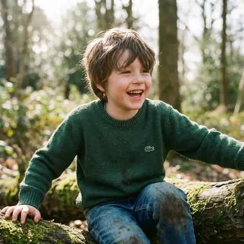 Young Boy in Green Sweater | Designer Logo on Sweater