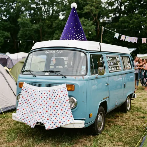 Festive Purple Party Hat on Compact Travel Vehicle