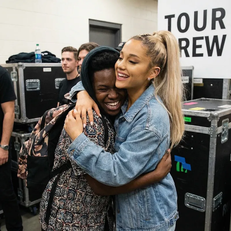 Ariana Grande Embracing African Person with Delight Ariana Grande Embracing African Person with Delight