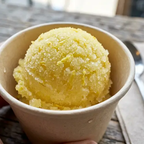 Zesty Lemon Sorbet - Flavorsome Ice Crystals in Neutral-Toned Tub