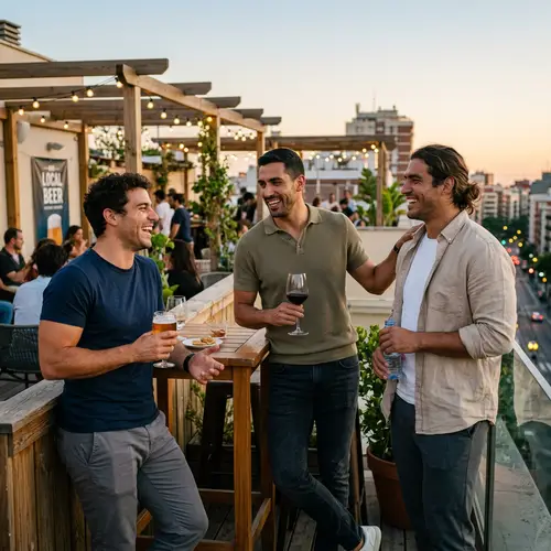 Trio of Latin-American Football Players Enjoying Drinks on Terrace