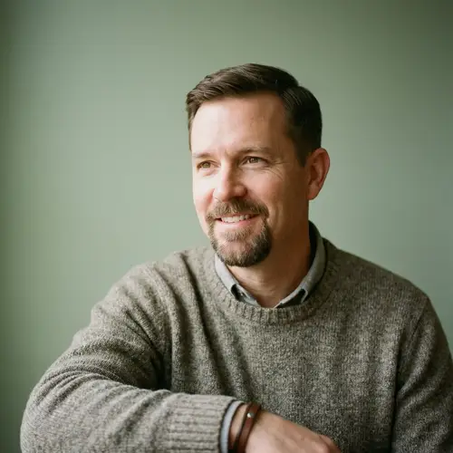 Confident Caucasian Man with Short Hair and Goatee