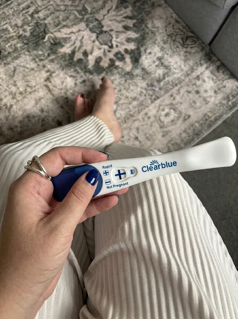 Positive Clear Blue Pregnancy Test in Hand